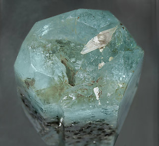 Beryl (variety aquamarine) with Muscovite and Quartz. Top