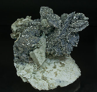 Lllingite with Molybdenite, Calcite, Arsenopyrite, Fluorite and Quartz.