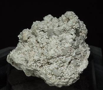 Stokesite with Albite, Microcline, smoky Quartz and Muscovite.