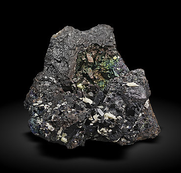 Cerussite after Anglesite on Goethite. Photo: Joaquim Calln