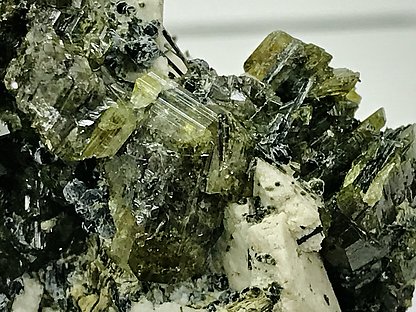 Titanite on Microcline with Ferro-actinolite. 