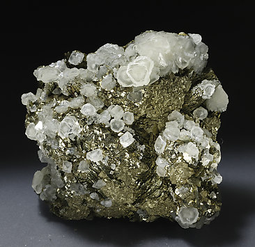 Pyrite with Marcasite, Calcite and Muscovite. Photo: Joaquim Callén