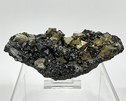 Octahedral Pyrite with Magnetite and Calcite. 