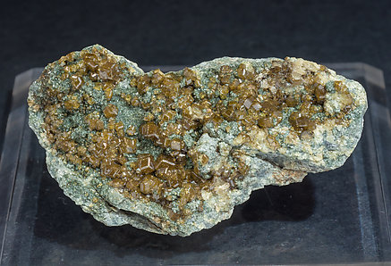 Andradite (variety topazolite) with Clinochlore.