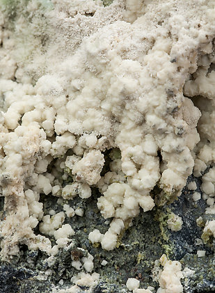 Crandallite after Fluellite with Metavariscite. 