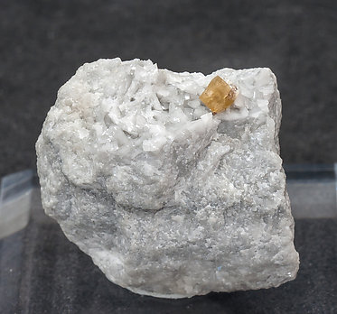 Synchysite-(Ce)/Parisite-(Ce) with Dolomite and Talc.