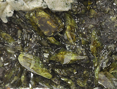 Titanite on Rutile after Ilmenite and with Microcline. 