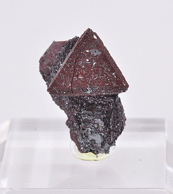 Zunyite with Hematite.