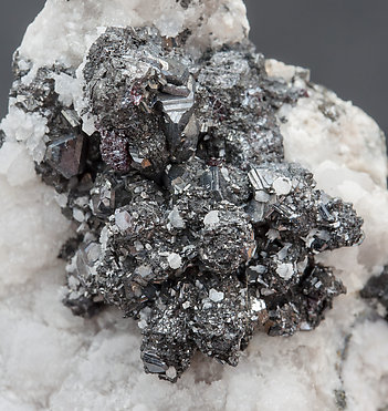 Pearceite-T2ac with Proustite and Calcite. 