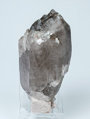 Quartz (variety smoky) with inclusions and Orthoclase. Front