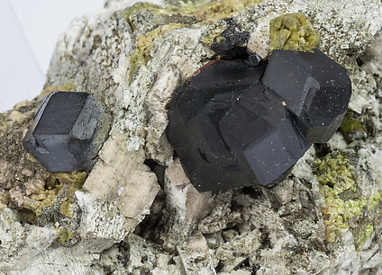 Andradite on Microcline and Epidote. 