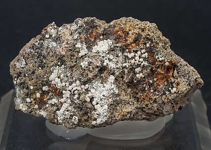 Yuanfuliite with Hematite, Calcite and Diopside.