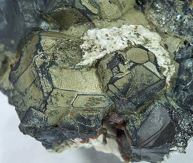 Andradite with Pyrite and Microcline. 