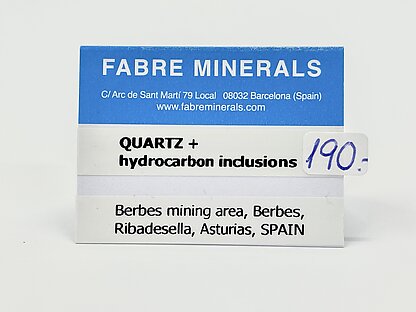 Quartz with hydrocarbon inclusions. 