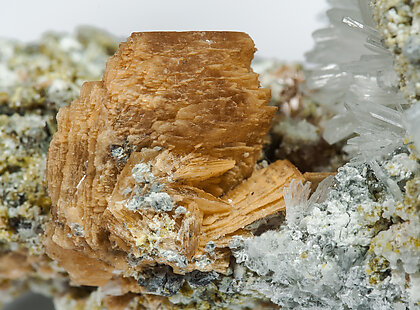 Roweite with Olshanskyite and Andradite.