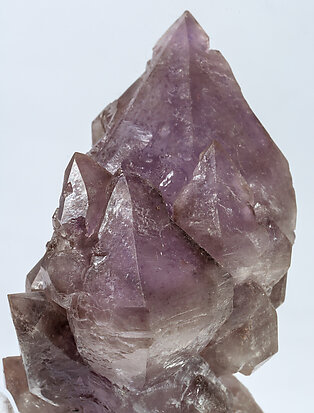 Quartz (variety amethyst) and Quartz (variety smoky). 