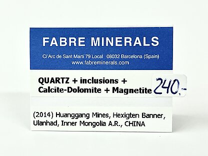 Quartz with inclusions, Calcite-Dolomite and Magnetite. 