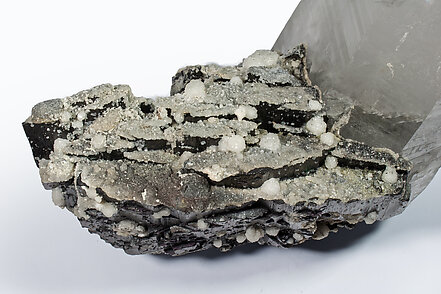 Ferberite with Quartz, Calcite-Dolomite and Siderite. 