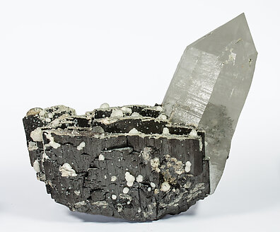 Ferberite with Quartz, Calcite-Dolomite and Siderite.