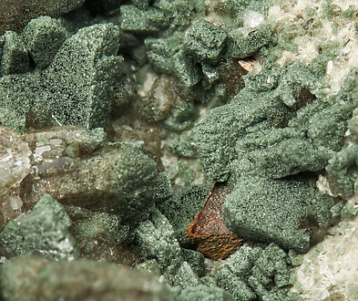 Hematite with Anatase, Quartz and Chlorite inclusions.