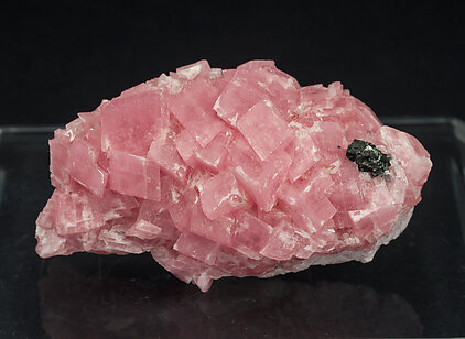 Rhodochrosite with Chalcopyrite. 