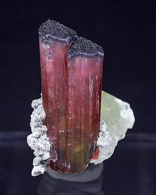 Elbaite-Schorl Series (variety rubellite) with Feldspar and Quartz. 