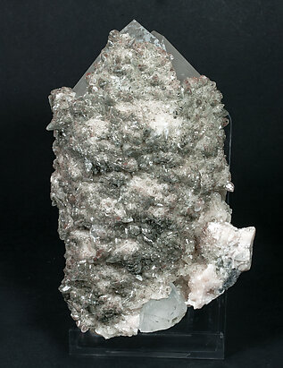Quartz with Calcite and Pyrite inclusions. Rear