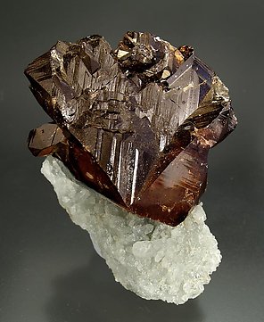 Cassiterite on Quartz.