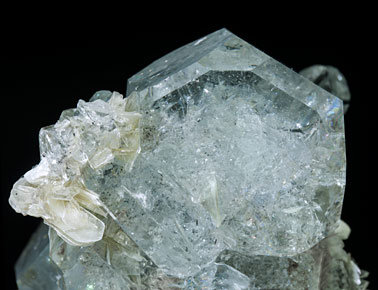 Beryl (variety aquamarine) with Muscovite. 