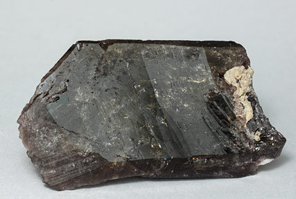 Axinite-(Fe) with Calcite. 