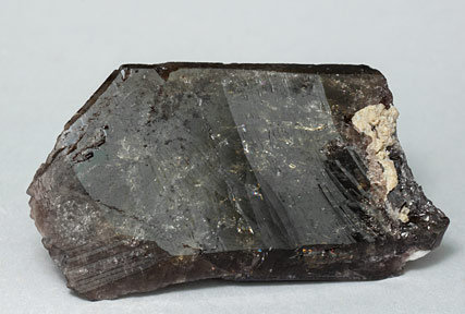 Axinite-(Fe) with Calcite.