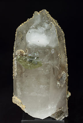 Quartz with Fluorapatite inclusions and with Muscovite, Siderite and Calcite.