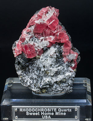 Rhodochrosite with Quartz, Tetrahedrite and Pyrite.