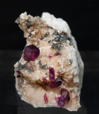 Mg-rich Roselite with Cu-rich Cobaltaustinite and Cobaltlotharmeyerite on Dolomite. 