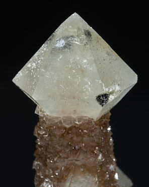 Quartz with inclusions, Calcite-Dolomite and Magnetite. 