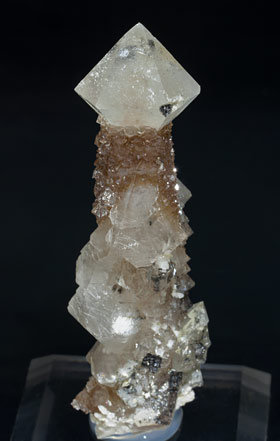 Quartz with inclusions, Calcite-Dolomite and Magnetite. 