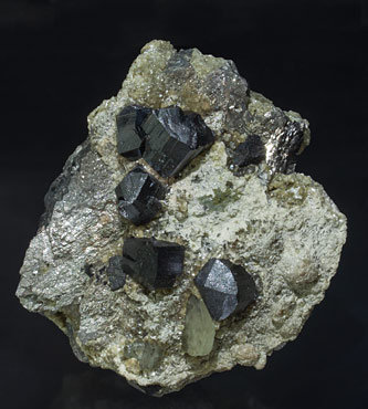 Cassiterite with Arsenopyrite, Fluorapatite, Calcite and Muscovite. Front
