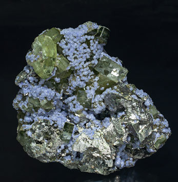 Fluorite with Fluorapatite, Arsenopyrite, Calcite and Muscovite. 