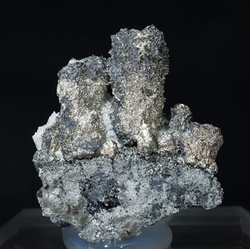 Silver with Arsenopyrite silver-rich Tennantite and Pearceite.