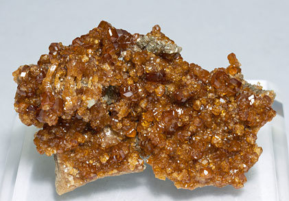 Grossular (variety hessonite) with Clinochlore.