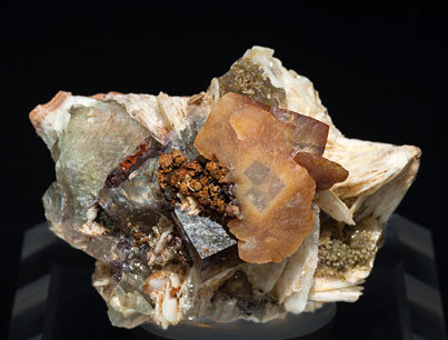 Wulfenite with Fluorite, Baryte and Pyromorphite.