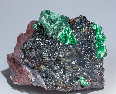 Malachite after Azurite on Goethite.