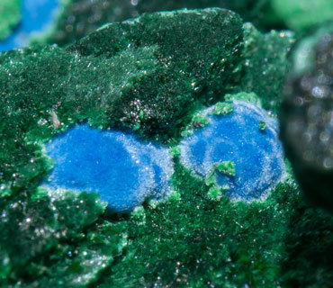 Malachite after Azurite with Plancheite. 