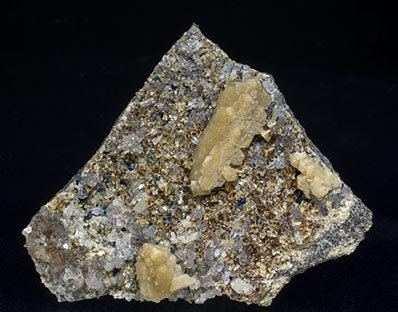 Whiteite-(CaFeMg) with Quartz, Siderite and Lazulite. 