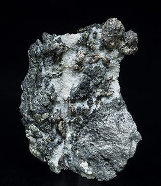 Silver with Arsenopyrite silver-rich Tennantite and Pearceite. 