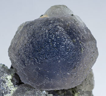 Fluorite with Siderite, Calcite, Chlorite and Arsenopyrite. 