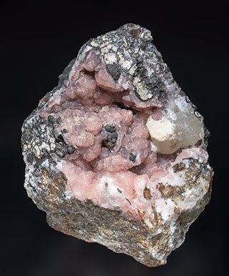 Rhodochrosite with Kentrolite. 