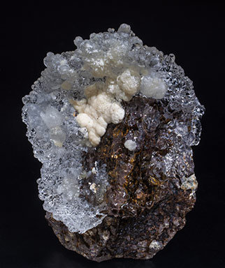 Opal (variety hyalite) with Aragonite. 