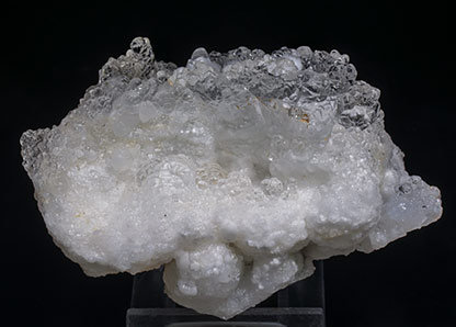 Opal (variety hyalite) on Aragonite. 