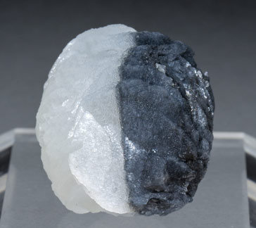 Calcite with Boulangerite inclusions. Rear